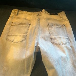 Slim fit distressed jeans